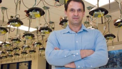 Ivan Seskar standing in a engineering laboratory