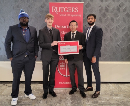 Four male students hold certificate third place certificate.