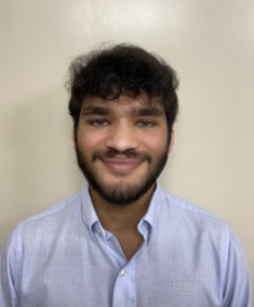 Headshot of Adam D'Souza