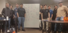 Nine members of the Rutgers Security team posing